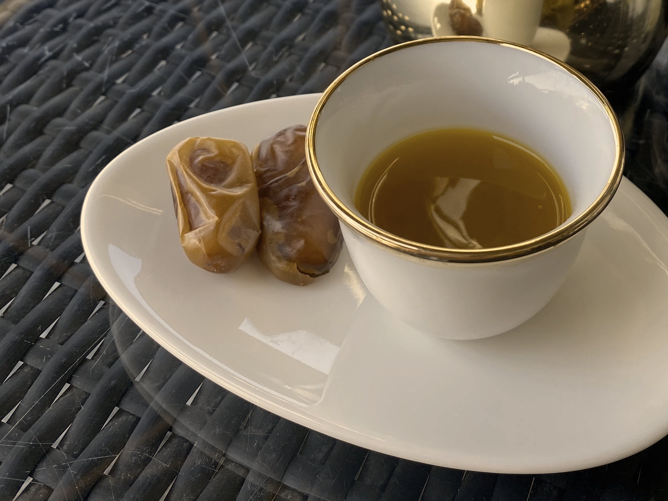 Arabic coffee served with dates
